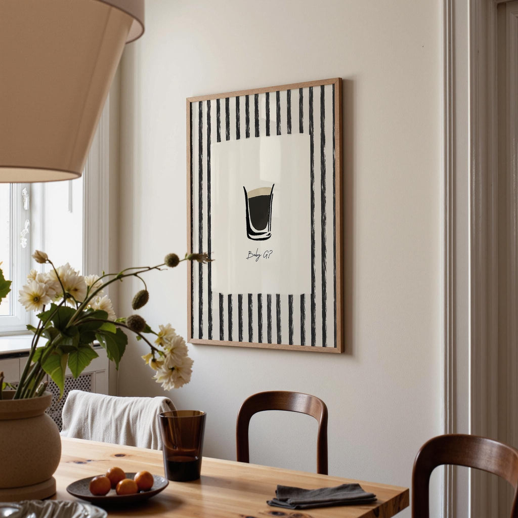 Dining room with a framed black and white abstract artwork on the wall.