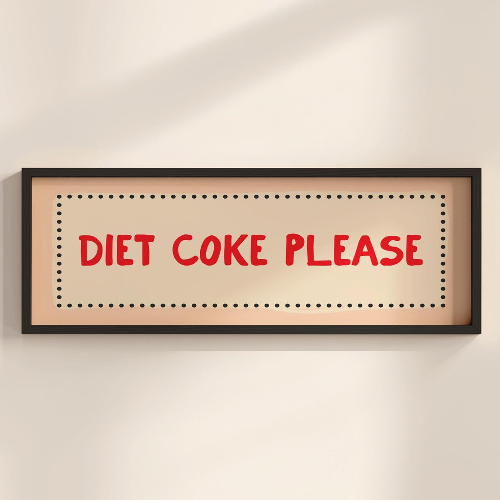 Framed sign with 'Diet Coke Please' text on a beige wall