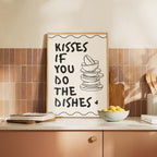 Kitchen counter with a framed print and tiled wall