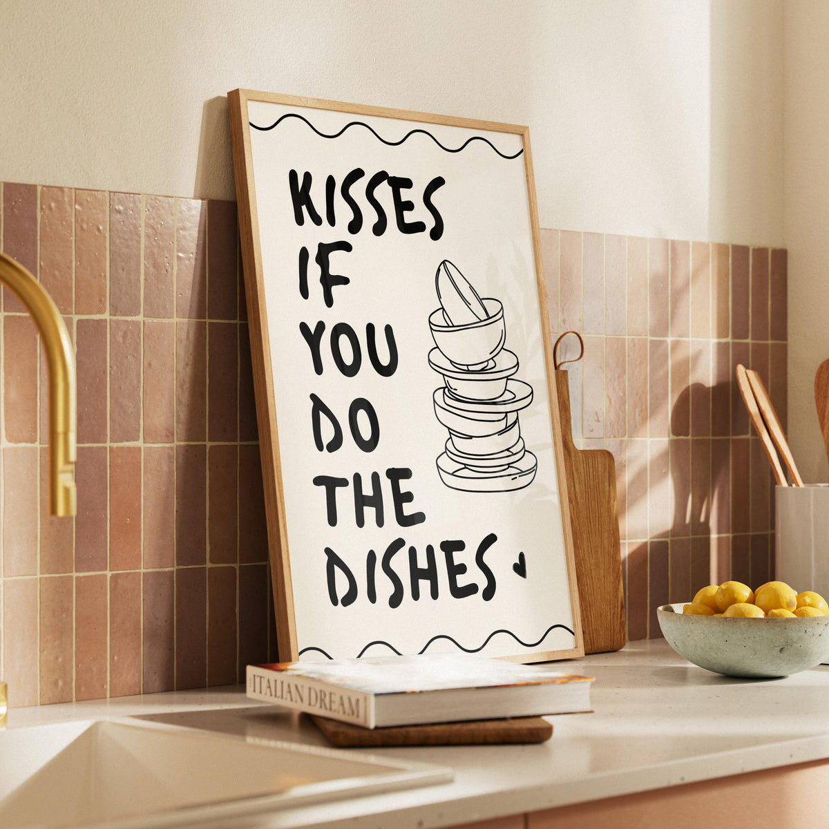 Decorative sign with text in a kitchen setting