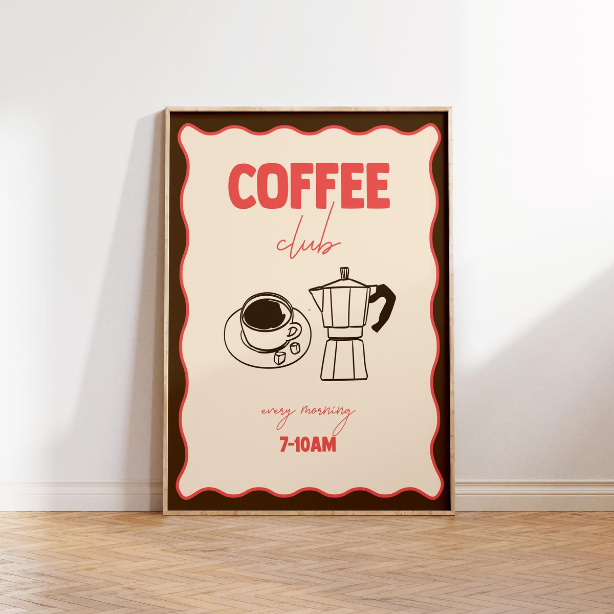 Framed poster with 'Coffee Club' design featuring a coffee cup and espresso machine on a white wall.