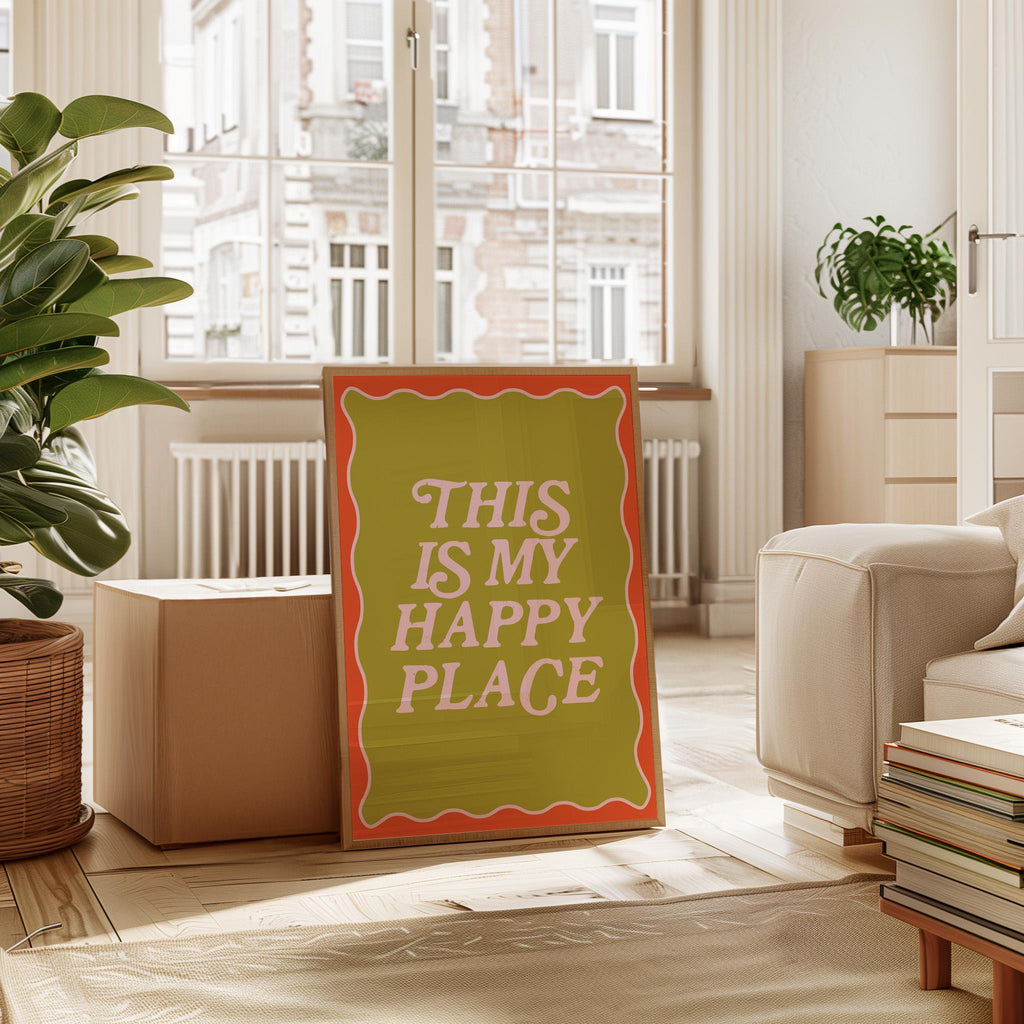 Decorative sign in a living room with 'This is my happy place' text, surrounded by plants and furniture.