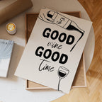 Poster with 'Good wine Good time' text and wine illustrations on a table with a cup and book.
