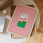 Framed artwork of a Perello can on a table with a cup of coffee and book.