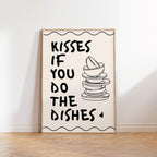 Framed artwork with text and stack of dishes on a white wall.