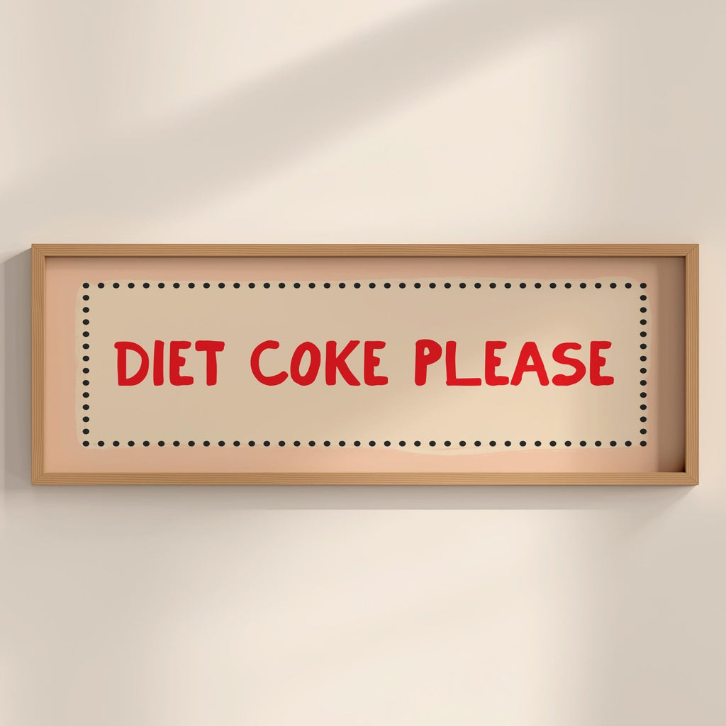 Framed sign with 'Diet Coke Please' text on a beige wall