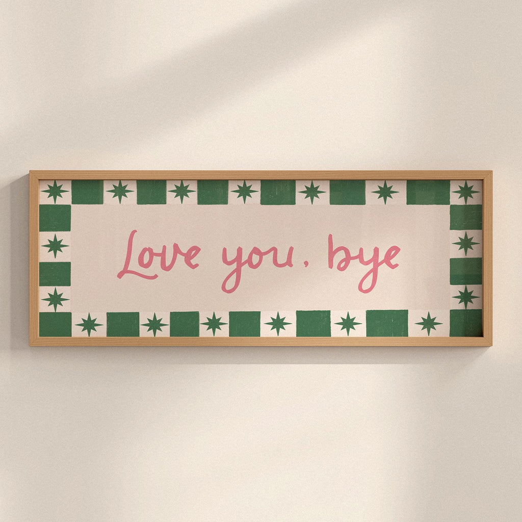 Framed artwork with 'Love you, bye' text on a beige background