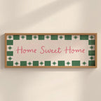 Decorative sign with 'Home Sweet Home' text on a wall