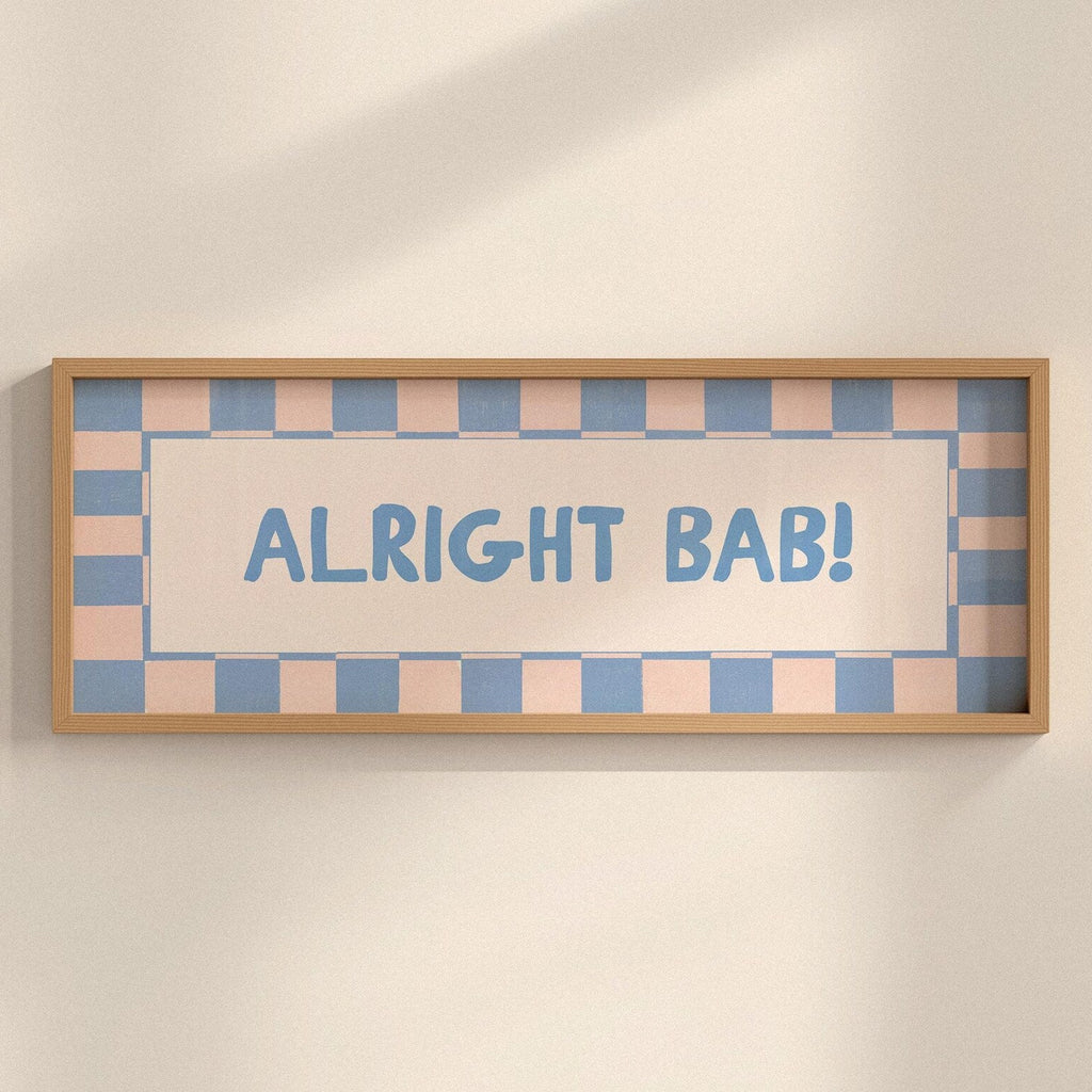 Framed sign with 'ALRIGHT BAB!' text on a checkered background